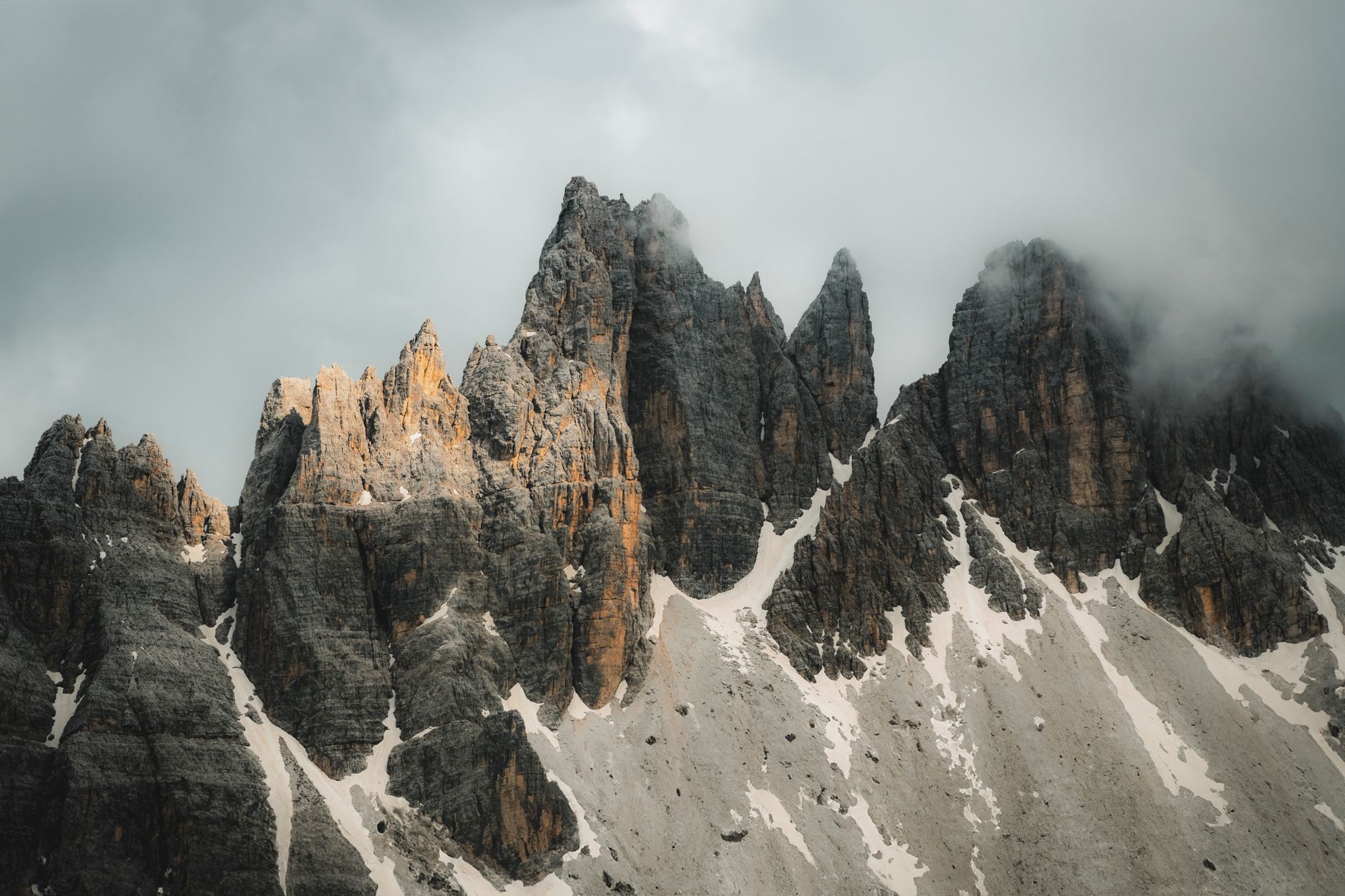 Dolomites peaks above clouds