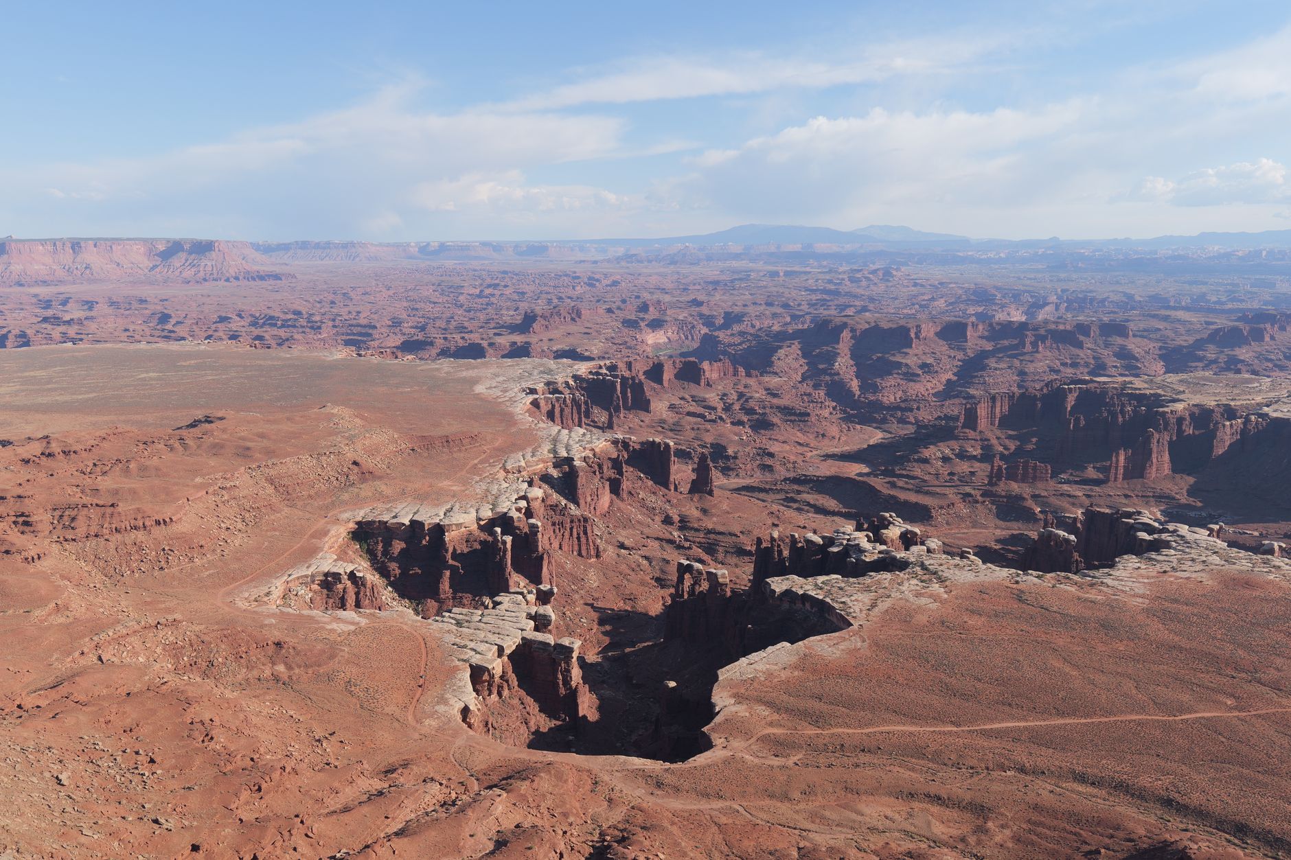 Sandstone canyon with trail markers