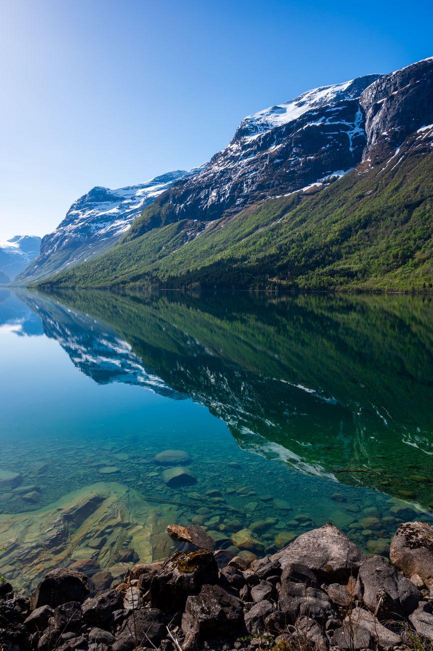 Scandinavian fjord with wooden sauna dock