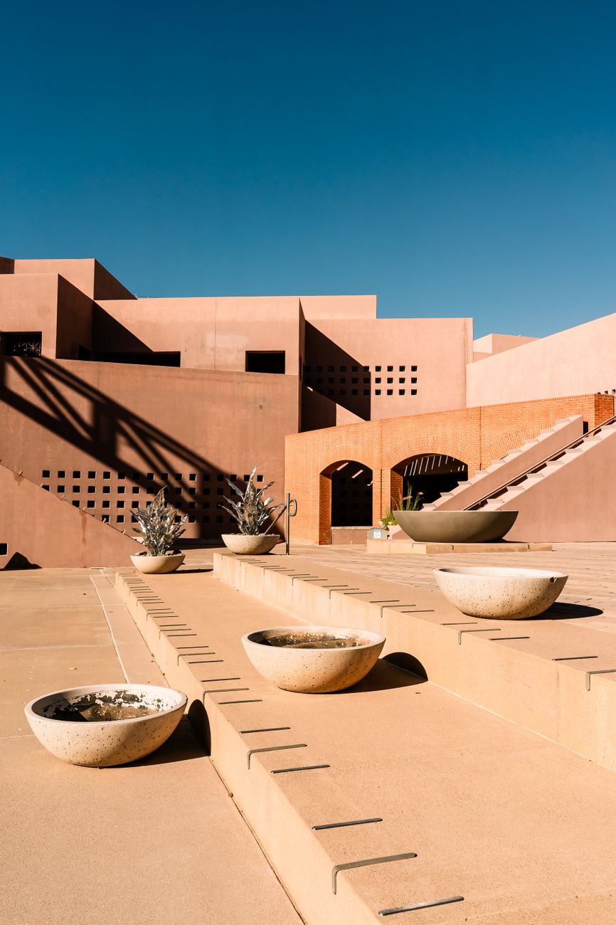 Minimalist desert architecture under vast blue sky